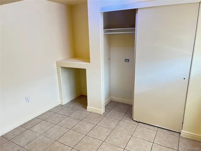 an empty room with closet
