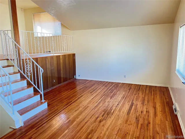 a view of entryway with wooden floor
