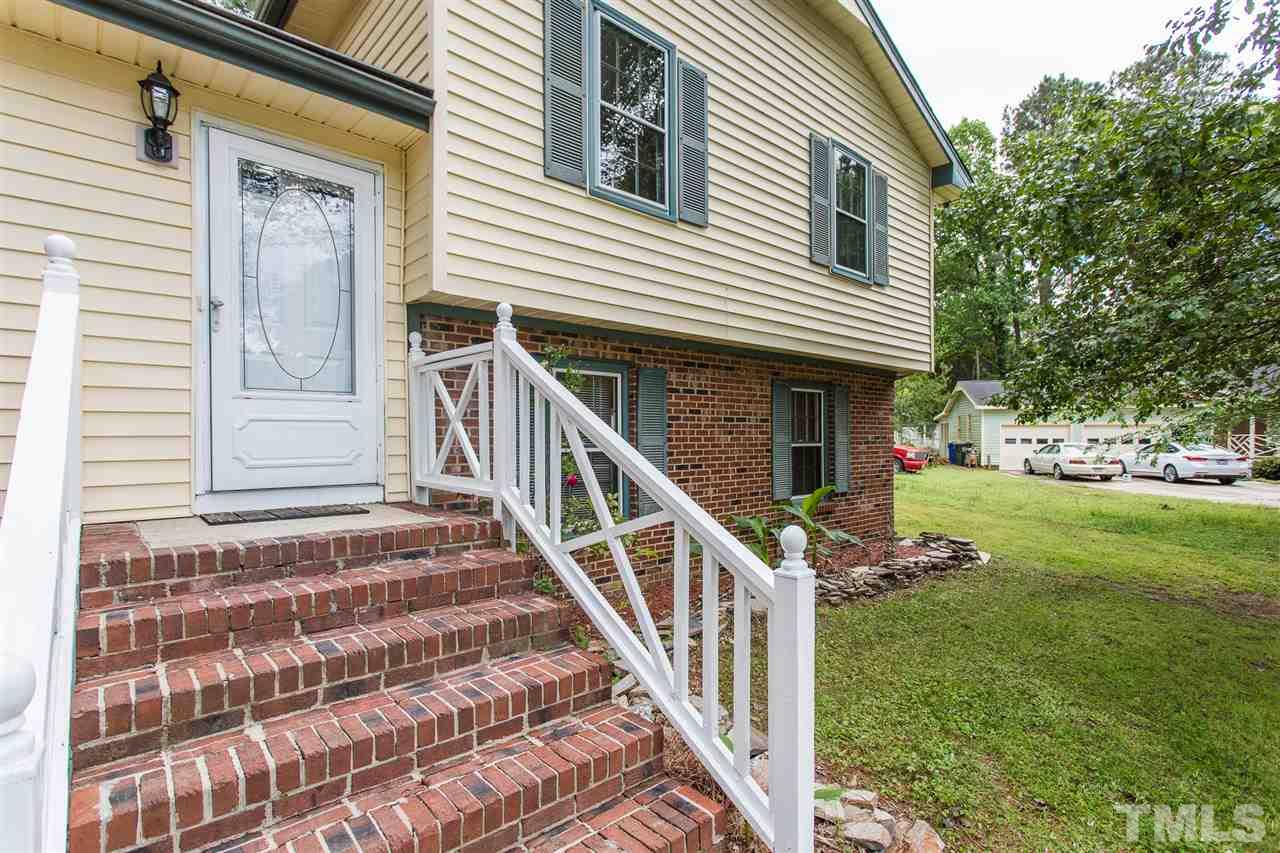 5508 Wettaw Lane Raleigh, NC 27616 - Photo 2 of 30 a front view of a house with a yard
