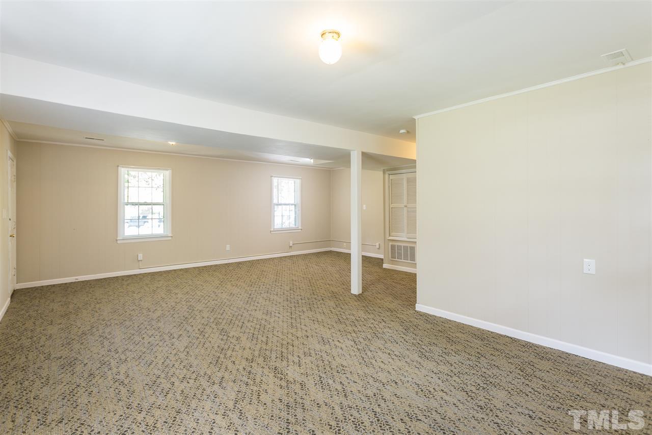5508 Wettaw Lane Raleigh, NC 27616 - Photo 28 of 30 an empty room with windows