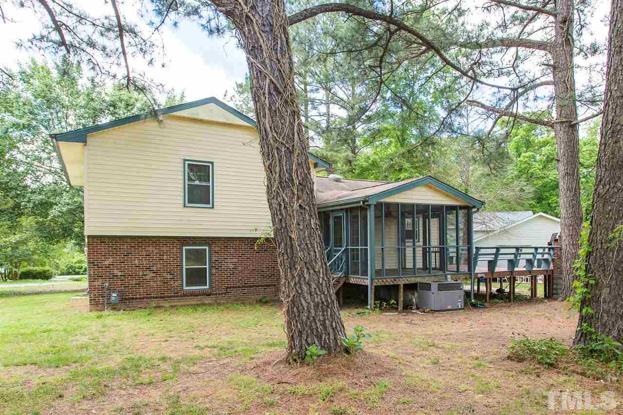5508 Wettaw Lane Raleigh, NC 27616 - Photo 4 of 30 a front view of a house with garden