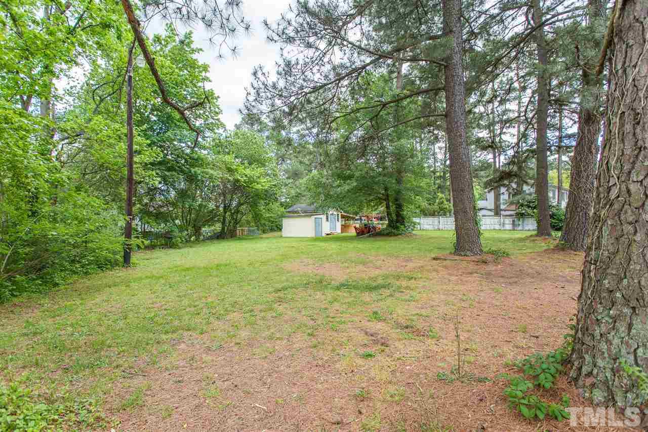 5508 Wettaw Lane Raleigh, NC 27616 - Photo 5 of 30 a view of a trees in a yard