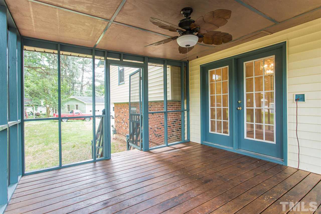5508 Wettaw Lane Raleigh, NC 27616 - Photo 8 of 30 a view of an empty room with wooden floor and a window