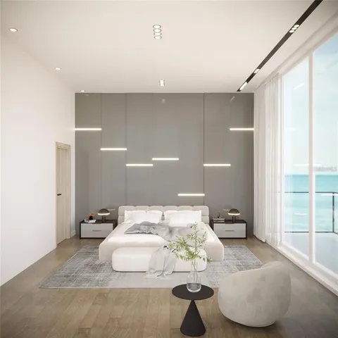 a living room with furniture a window and a lamp