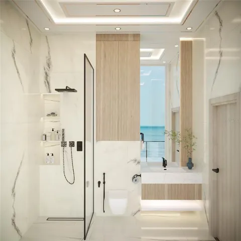 a bathroom with a bathtub and shower