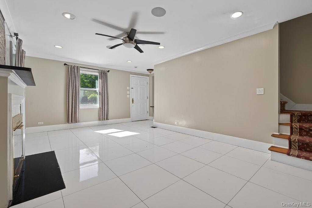 155 White Road Scarsdale, NY 10583 - Photo 11 of 30 a view of a livingroom with a flat screen tv