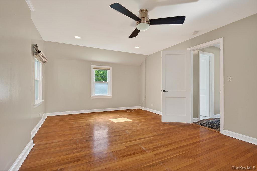 155 White Road Scarsdale, NY 10583 - Photo 14 of 30 wooden floor in an empty room with a window
