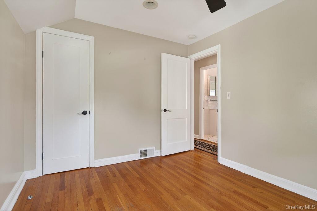 155 White Road Scarsdale, NY 10583 - Photo 20 of 30 a view of an empty room with wooden floor