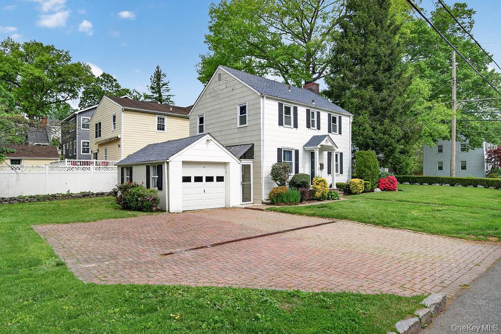 155 White Road Scarsdale, NY 10583 - Photo 2 of 30 a front view of a house with a yard