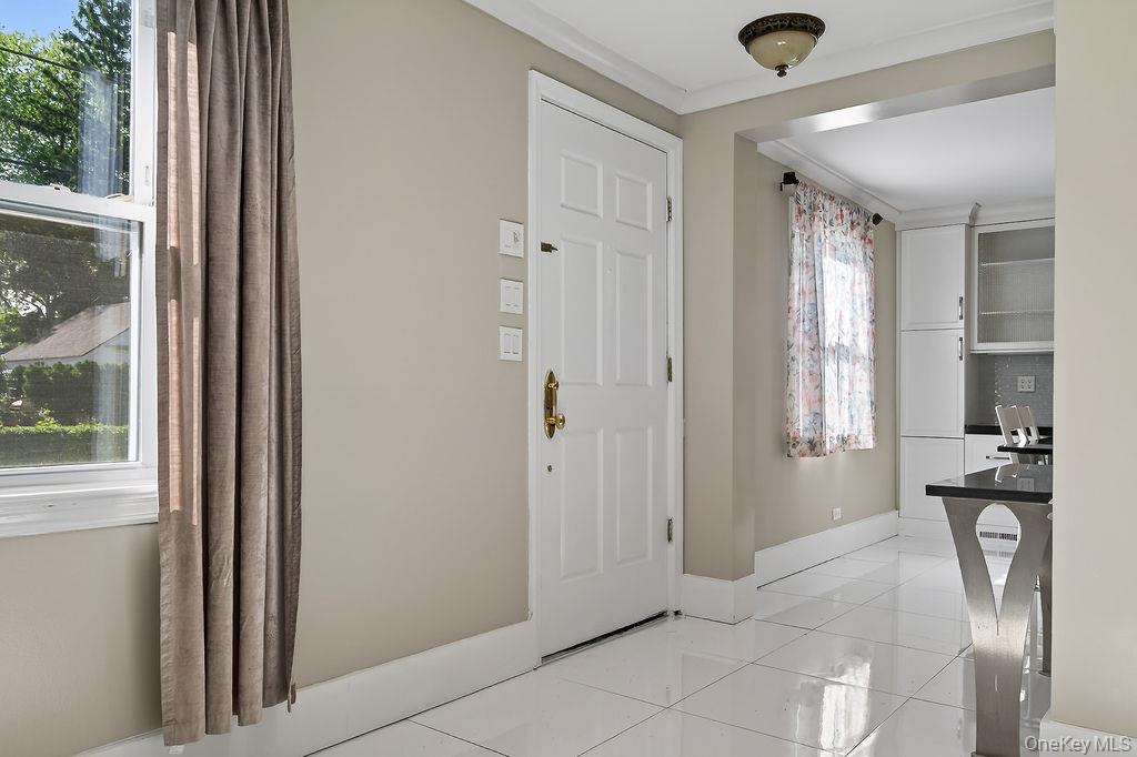 155 White Road Scarsdale, NY 10583 - Photo 4 of 30 a view of an entryway with wooden floor