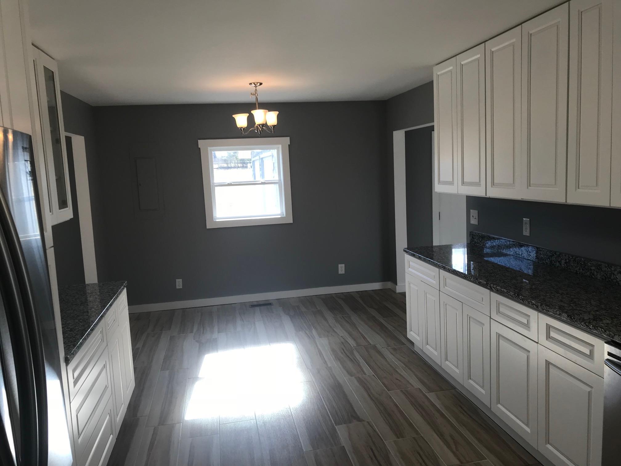 951 Lockmiller Road Winchester, TN 37398 - Photo 5 of 18 wooden floor in an empty room with a window