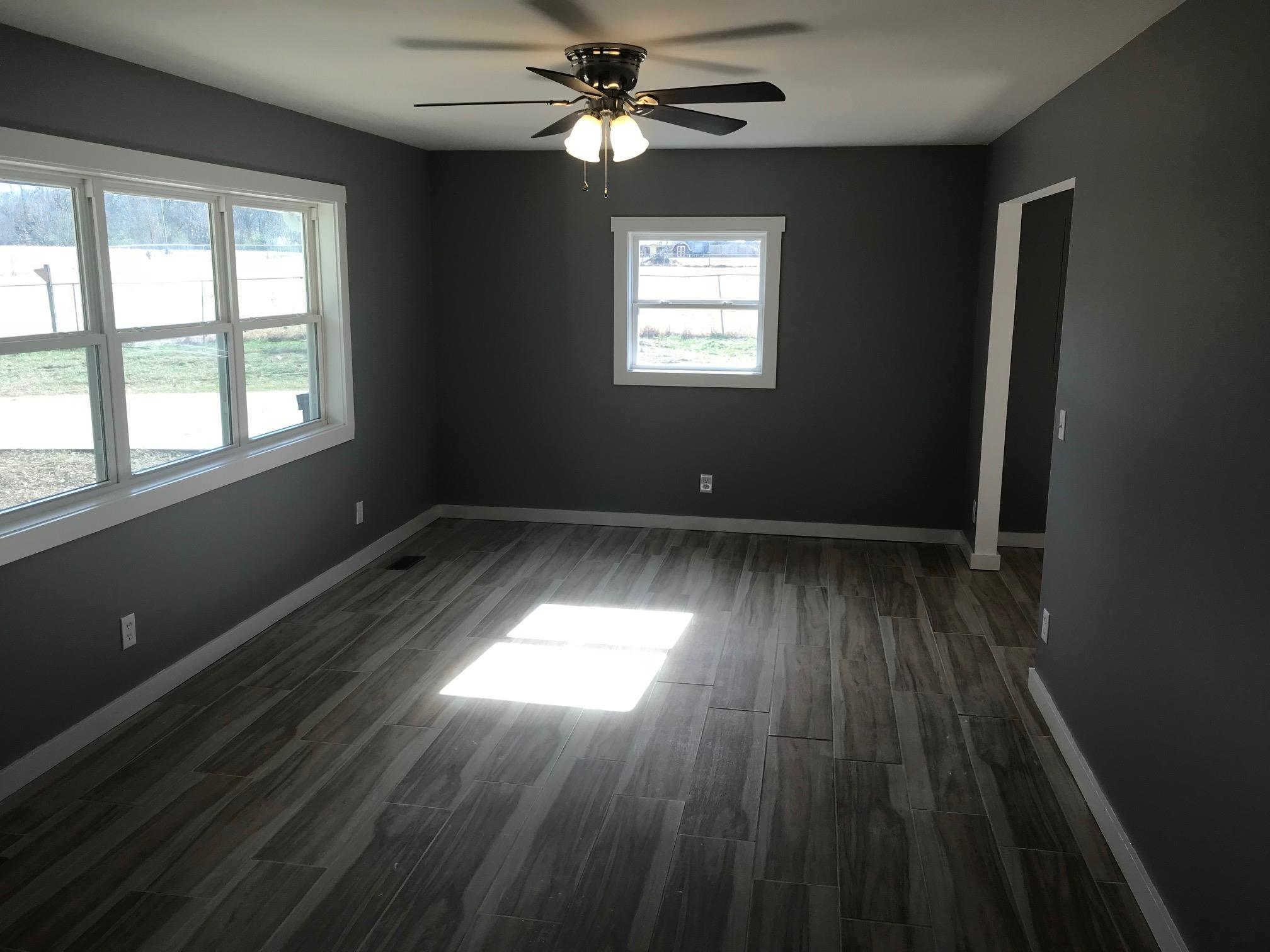 951 Lockmiller Road Winchester, TN 37398 - Photo 6 of 18 wooden floor in an empty room with a window