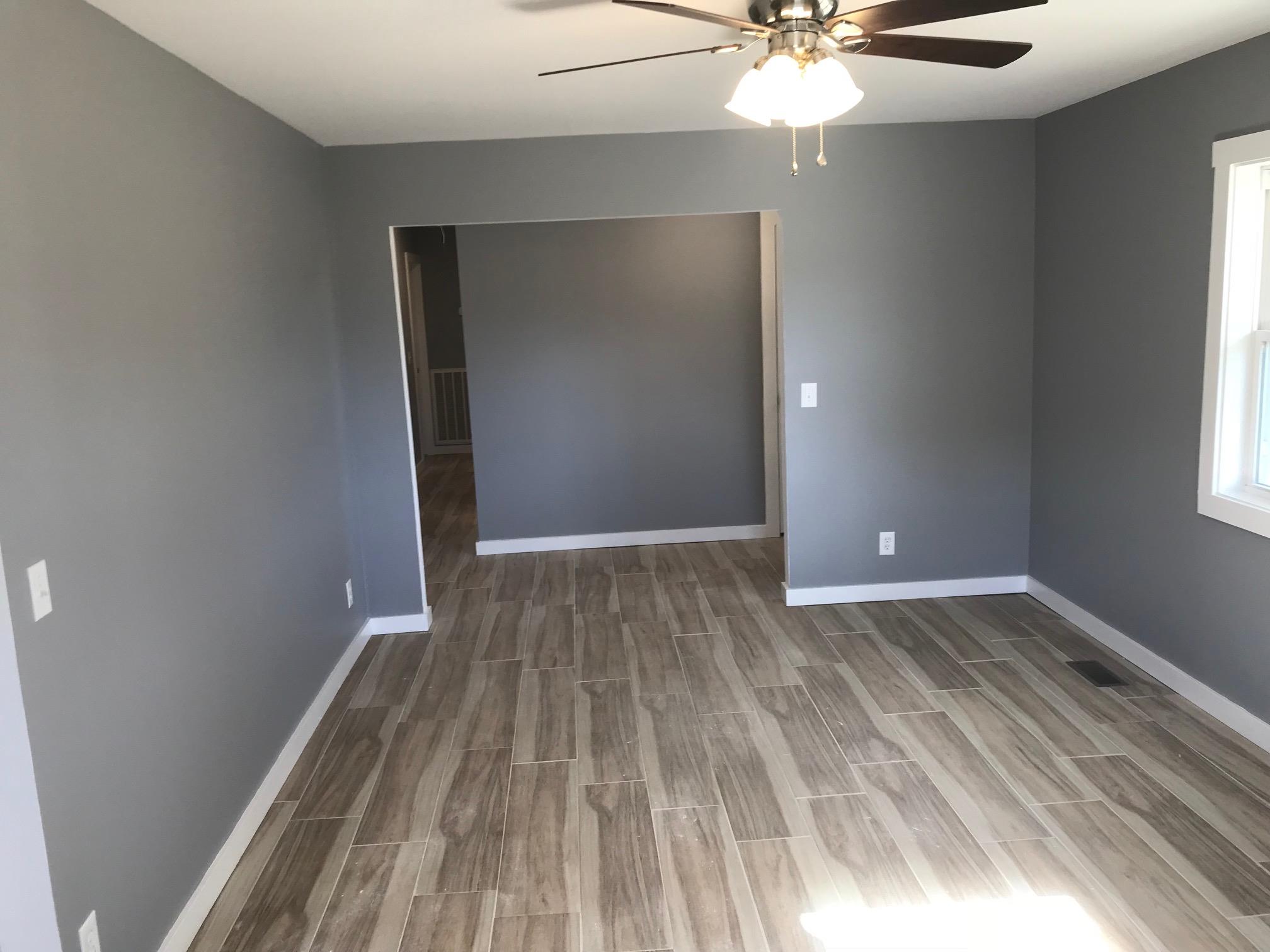 951 Lockmiller Road Winchester, TN 37398 - Photo 7 of 18 a view of a room with wooden floor and fan
