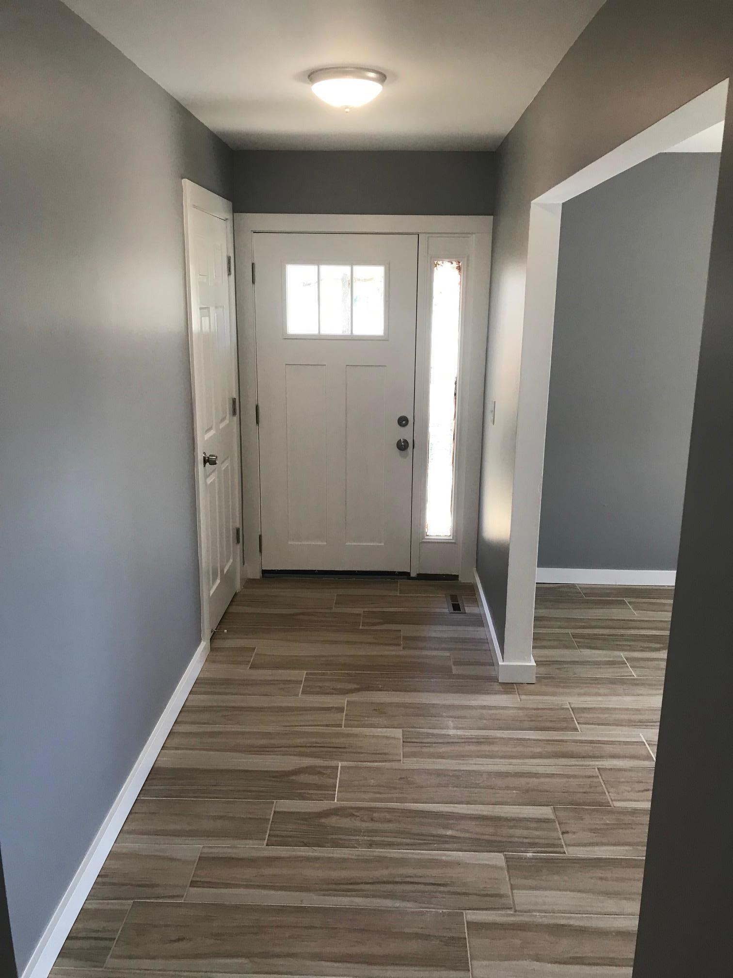 951 Lockmiller Road Winchester, TN 37398 - Photo 8 of 18 a view of a livingroom with wooden floor and window