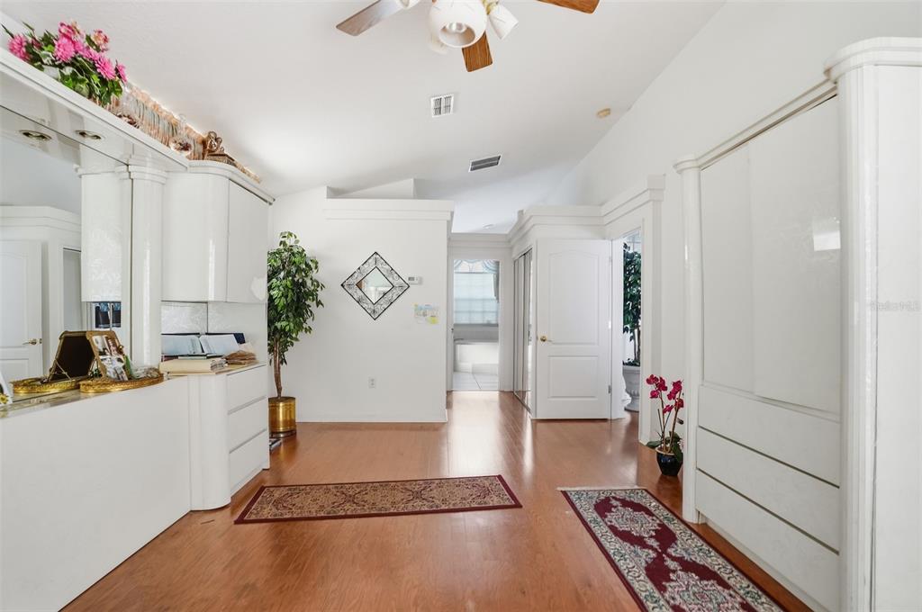 12054 Conway Street Spring Hill, FL 34609 - Photo 22 of 49 a living room with furniture and a potted plant