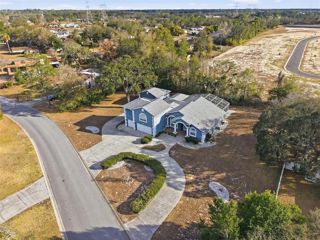 12054 Conway Street Spring Hill, FL 34609 - Photo 40 of 49 a view of a swimming pool with a patio