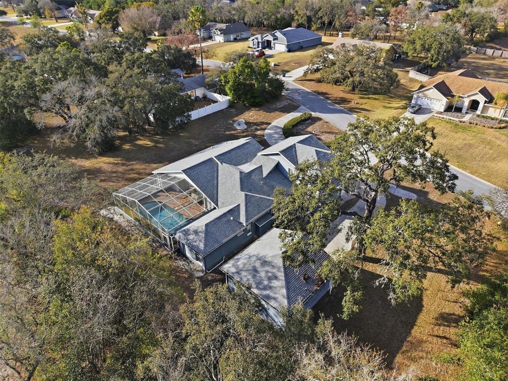 12054 Conway Street Spring Hill, FL 34609 - Photo 43 of 49 an aerial view of residential house with outdoor space