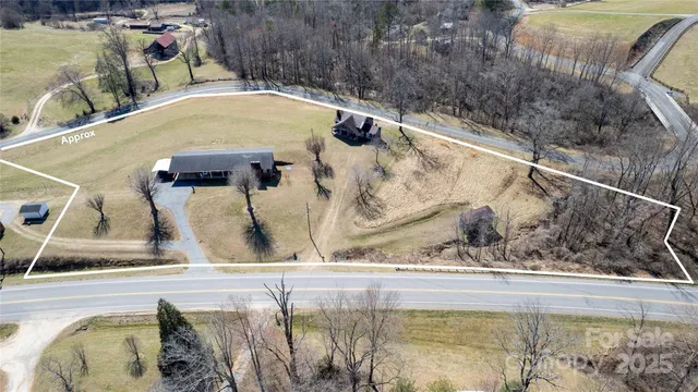 a view of swimming pool with a yard