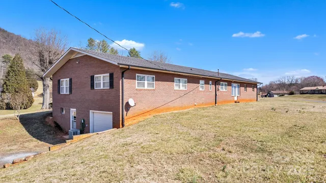 a house view with a backyard space