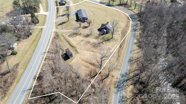 a view of balcony with a table and chairs