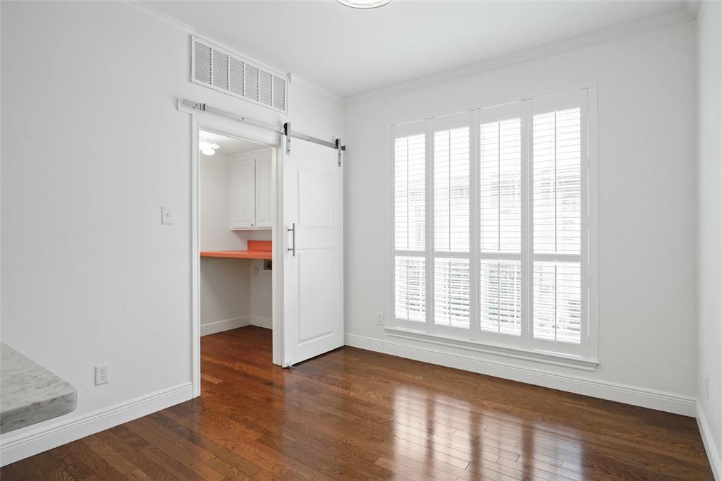 1229 Wooded Trail Hurst, TX 76053 - Photo 11 of 28 Dining room open to the kitchen with breakfast bar