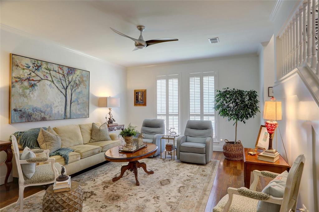 1229 Wooded Trail Hurst, TX 76053 - Photo 8 of 28 Living area featuring crown molding, wood finished floors, and ceiling fan