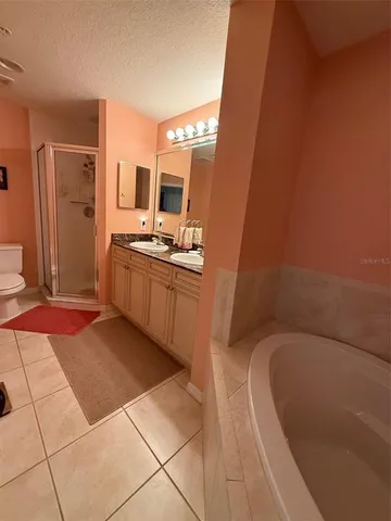 a bathroom with a bathtub and a sink
