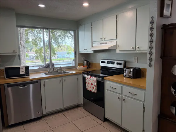 $115,000 | 9330 Lime Bay Boulevard, Unit 208, Tamarac, FL 33321