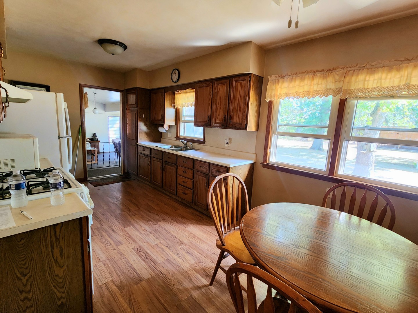 45 Locust Street Prophetstown, IL 61277 - Photo 6 of 14 a view of a dining room with furniture window and wooden floor