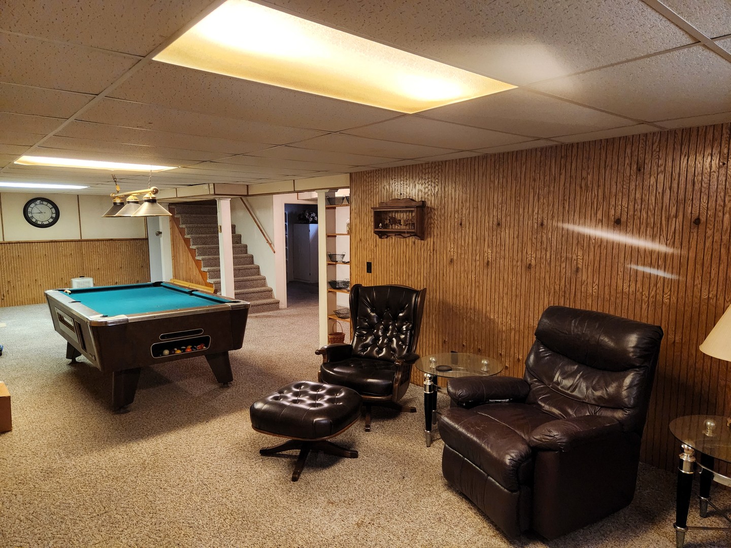 45 Locust Street Prophetstown, IL 61277 - Photo 10 of 14 a living room with furniture and a flat screen tv