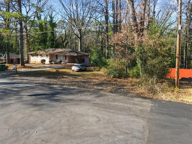 a picture of a bathroom with a bathtub and shower