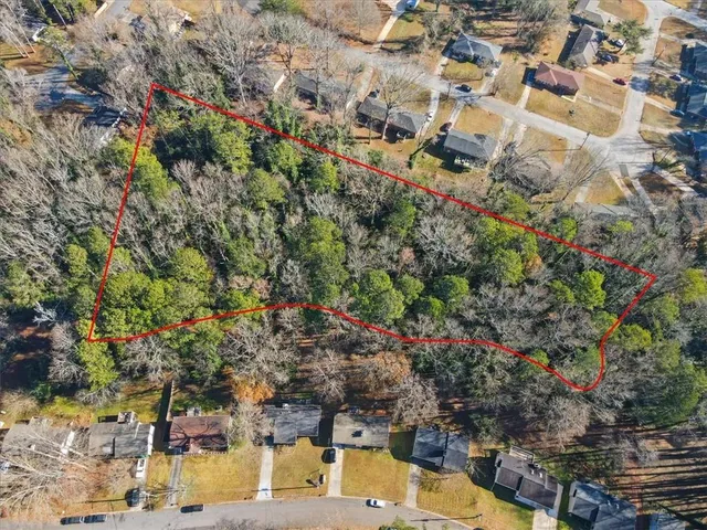 an aerial view of residential house with parking space