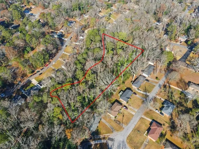 a view of outdoor space with lots of trees