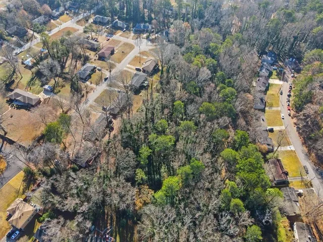 a view of street with parked cars