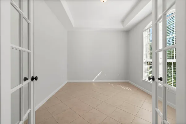 a view of an empty room with a window