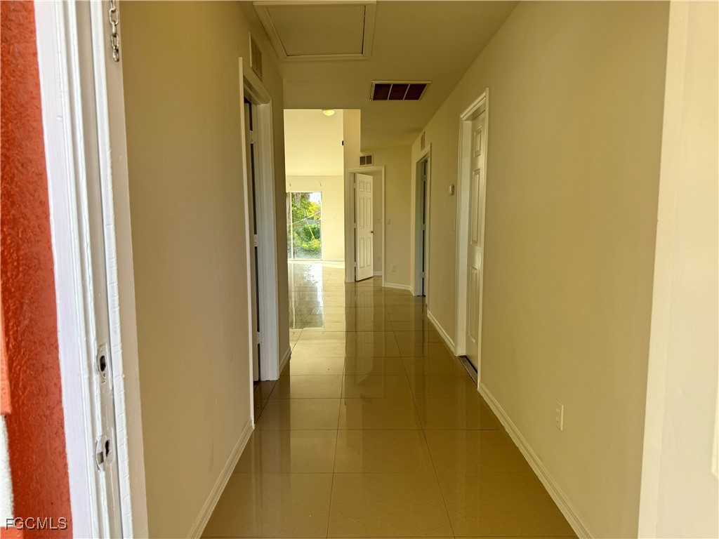 10743 Robinson Street Fort Myers, FL 33908 - Photo 9 of 11 a view of a hallway