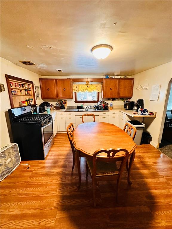 532 Washington Street Parker, PA 16049 - Photo 8 of 19 a view of a dining room with furniture and wooden floor