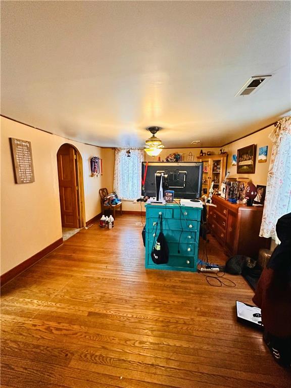532 Washington Street Parker, PA 16049 - Photo 10 of 19 a room with lots of chairs and wooden floor