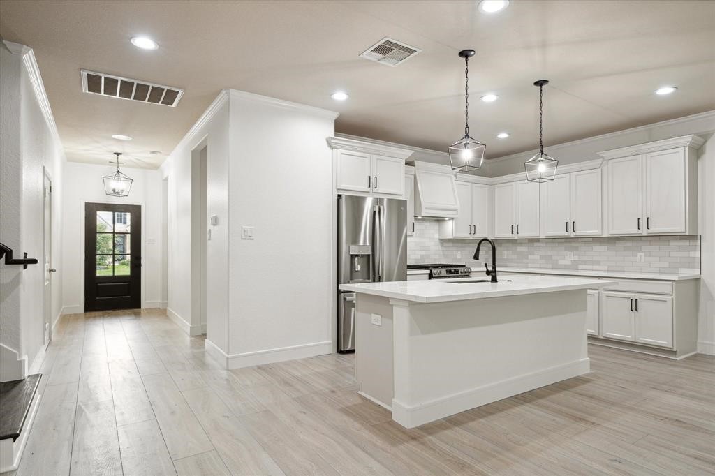 2732 Rogliano Lane League City, TX 77573 - Photo 6 of 30 Kitchen and Hallway