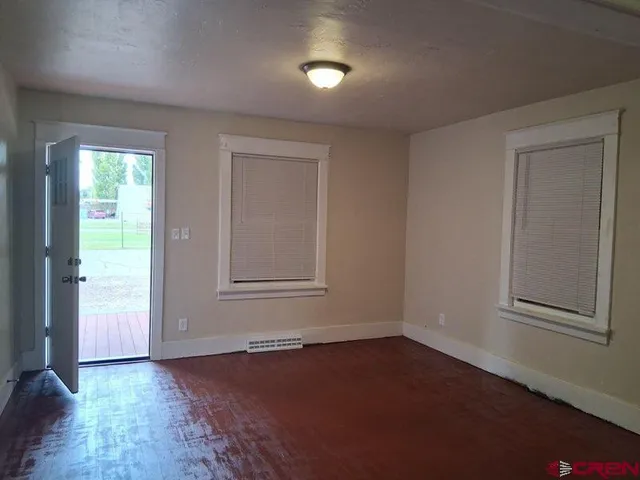 an empty room with window