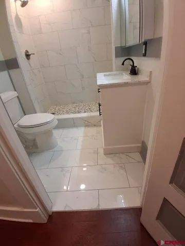 a bathroom with a sink and a toilet
