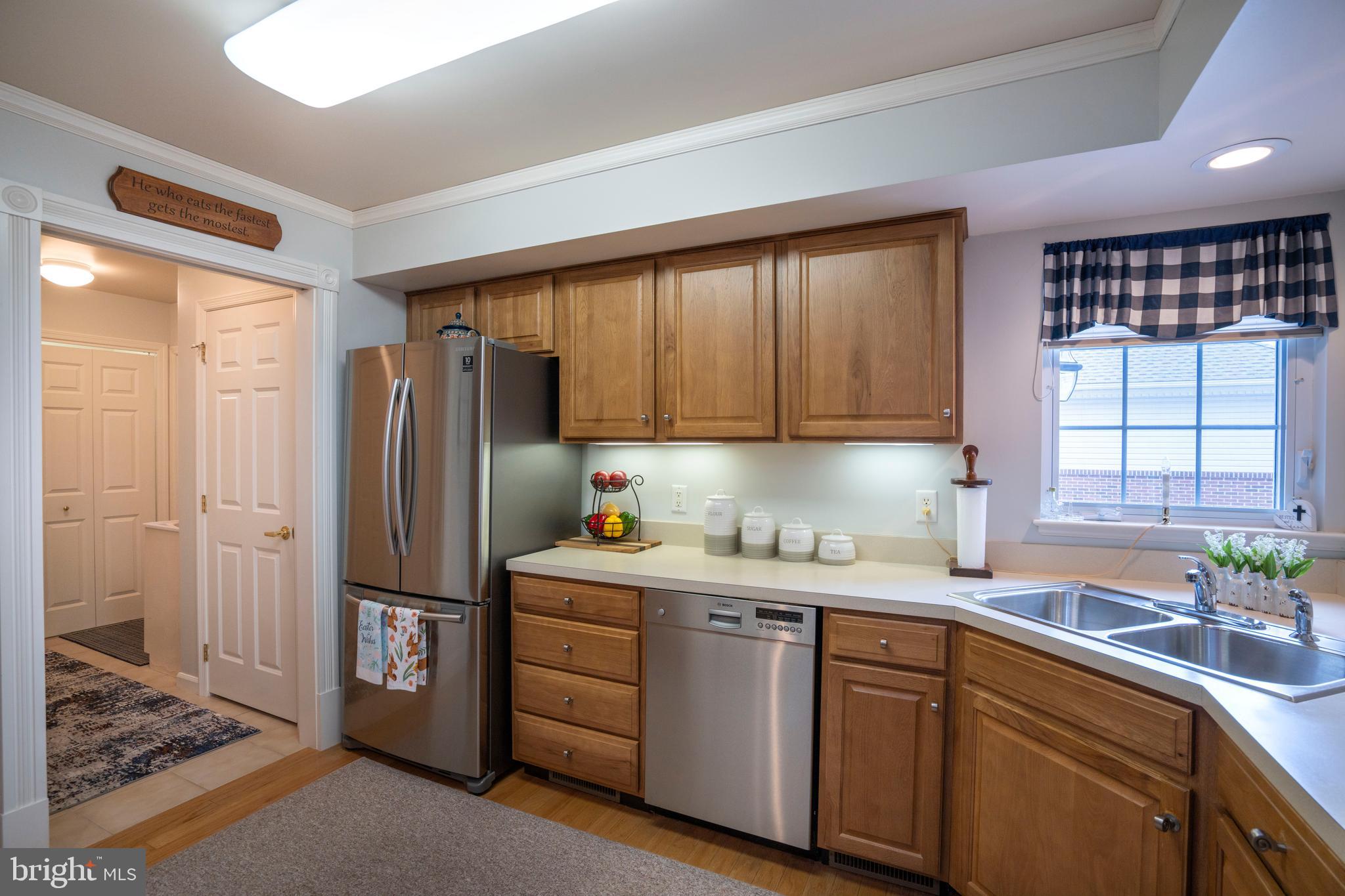 3291 Shellers Bend, Unit 715 State College, PA 16801 - Photo 13 of 45 a kitchen with a sink a refrigerator and window