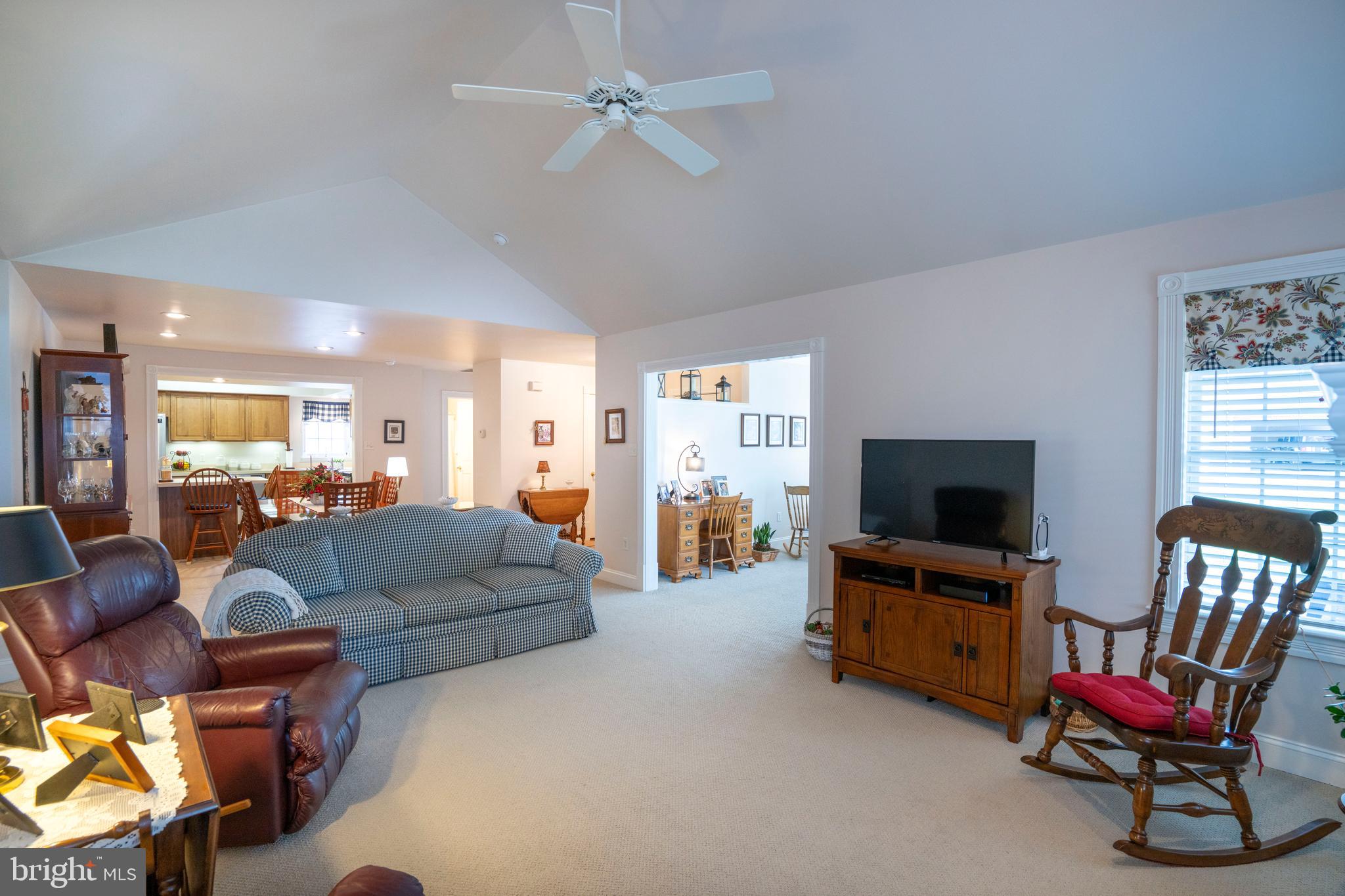 3291 Shellers Bend, Unit 715 State College, PA 16801 - Photo 22 of 45 a living room with furniture and a flat screen tv