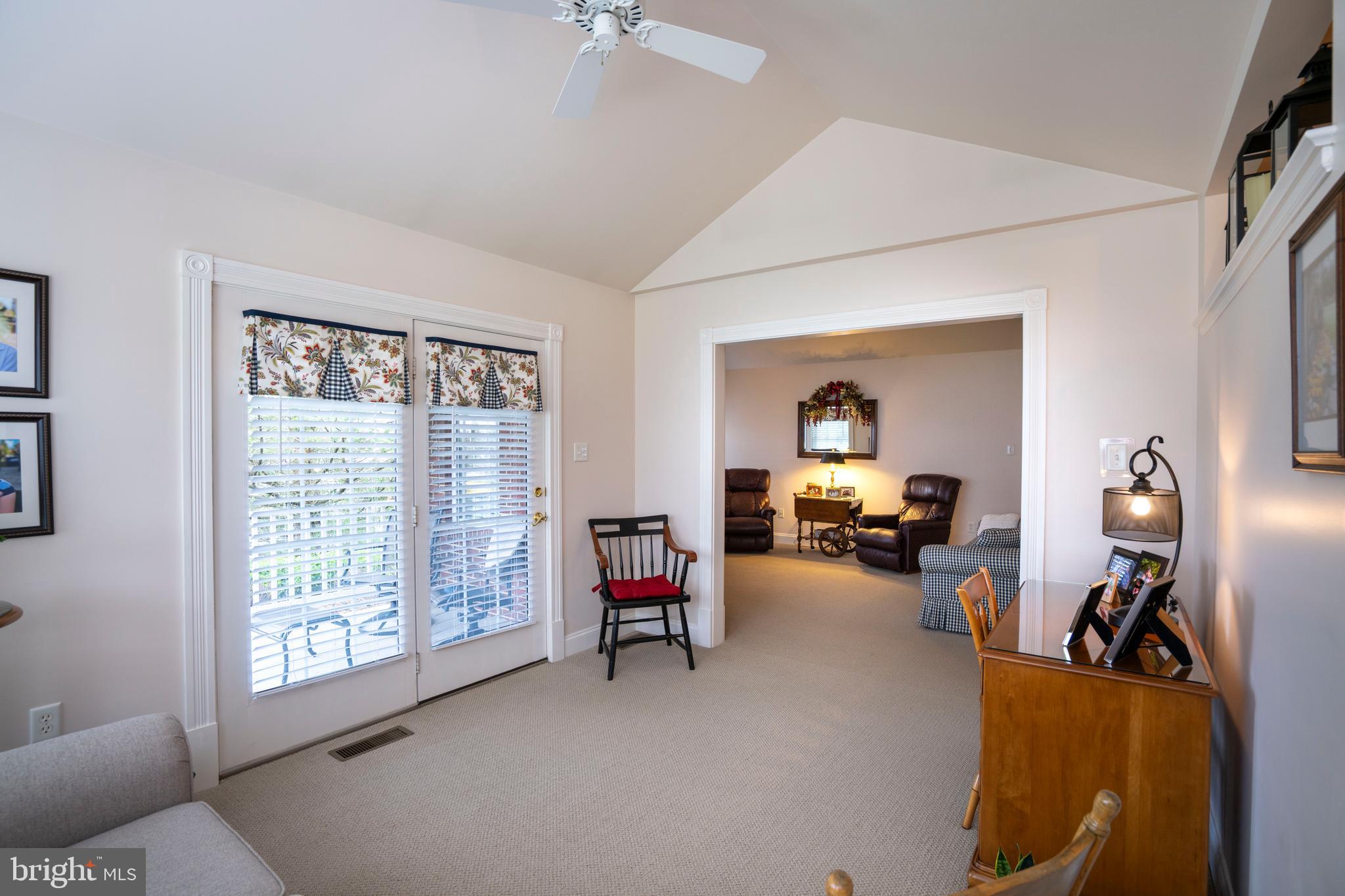 3291 Shellers Bend, Unit 715 State College, PA 16801 - Photo 24 of 45 a view of a livingroom with furniture and a large window