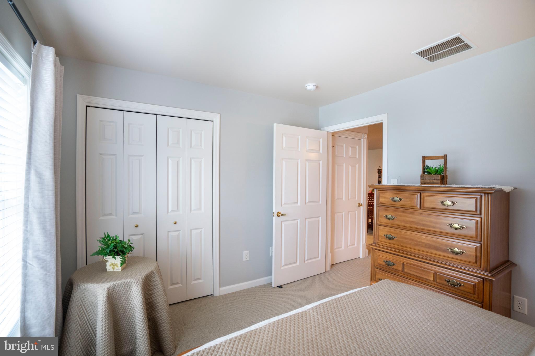 3291 Shellers Bend, Unit 715 State College, PA 16801 - Photo 29 of 45 a room with furniture and a window
