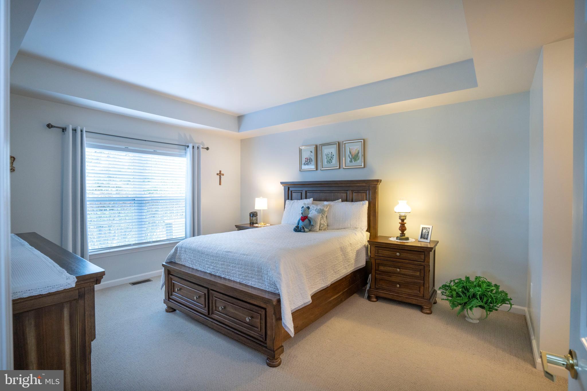 3291 Shellers Bend, Unit 715 State College, PA 16801 - Photo 30 of 45 a bedroom with a bed and a window