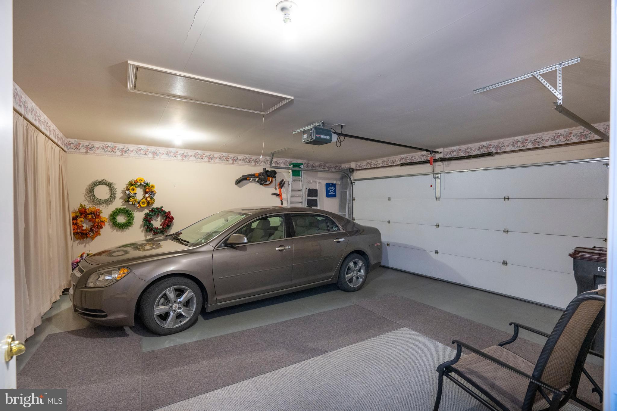 3291 Shellers Bend, Unit 715 State College, PA 16801 - Photo 36 of 45 a car parked in a garage