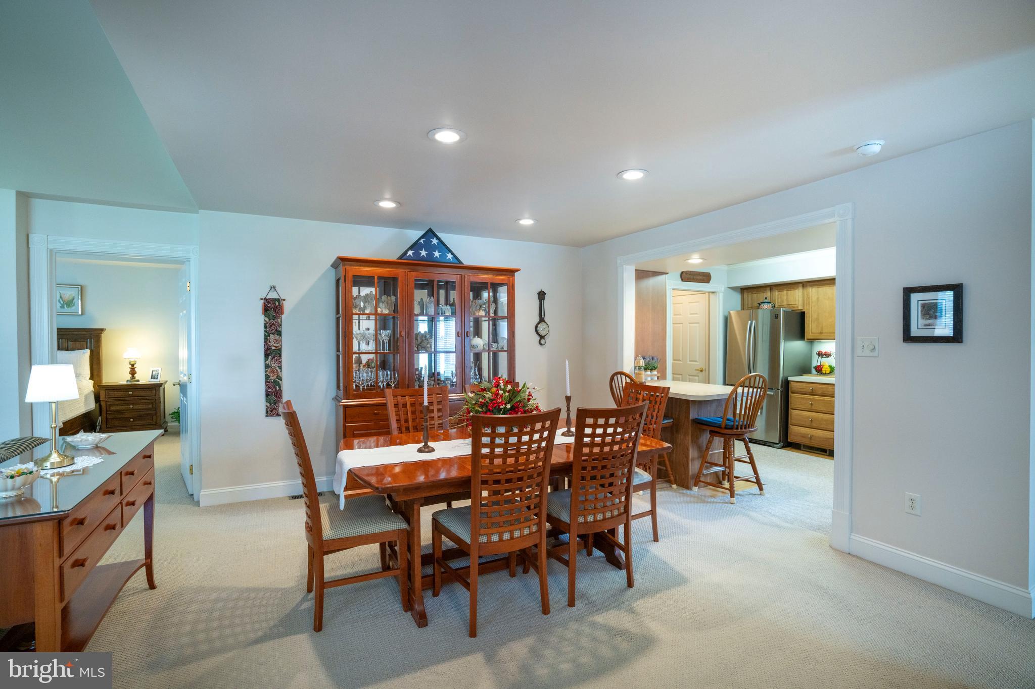 3291 Shellers Bend, Unit 715 State College, PA 16801 - Photo 10 of 45 a view of a dining room with furniture