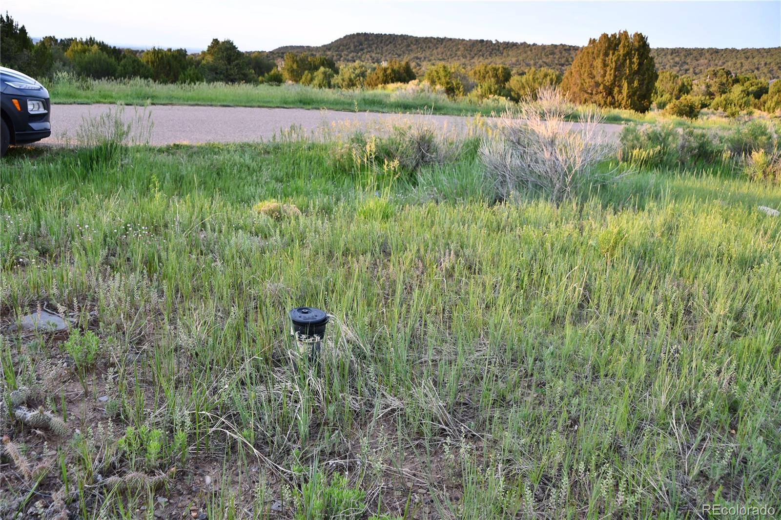 406 Riata Drive Trinidad, CO 81082 - Photo 5 of 12 a view of lake with houses in the background