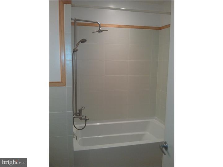 1019 Temple Road Pottstown, PA 19465 - Photo 10 of 13 a bathroom with a glass shower door